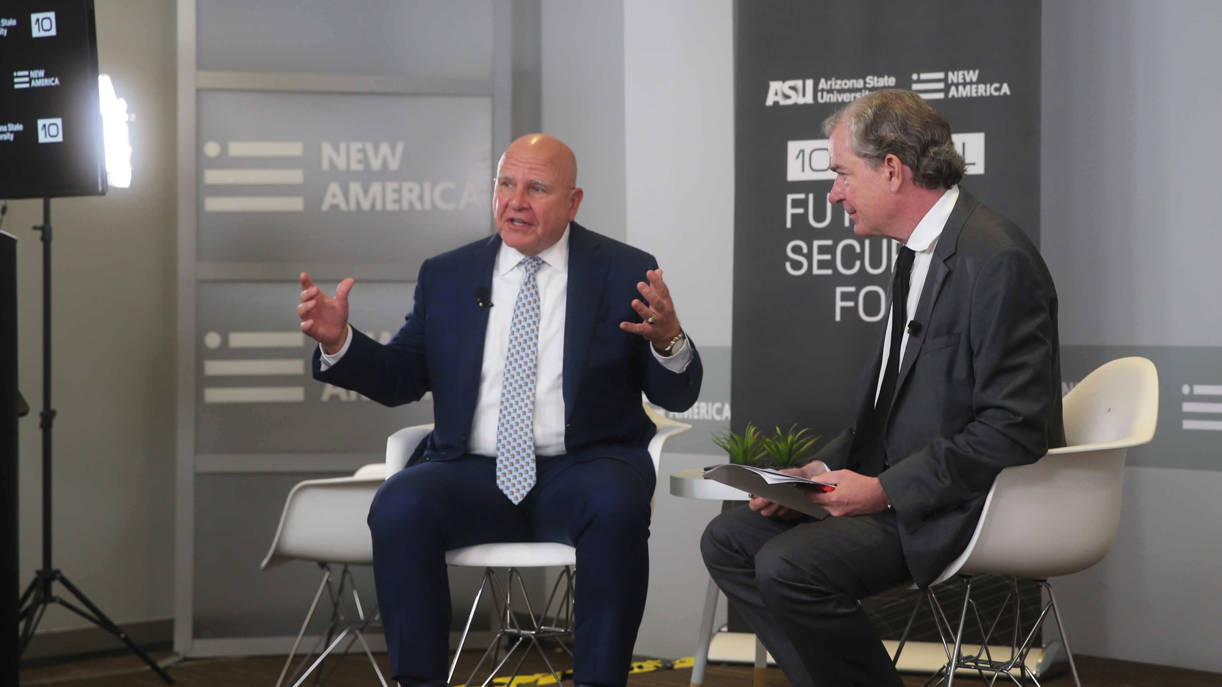 Lt. Gen. H.R. McMaster speaking while seated on a stage.