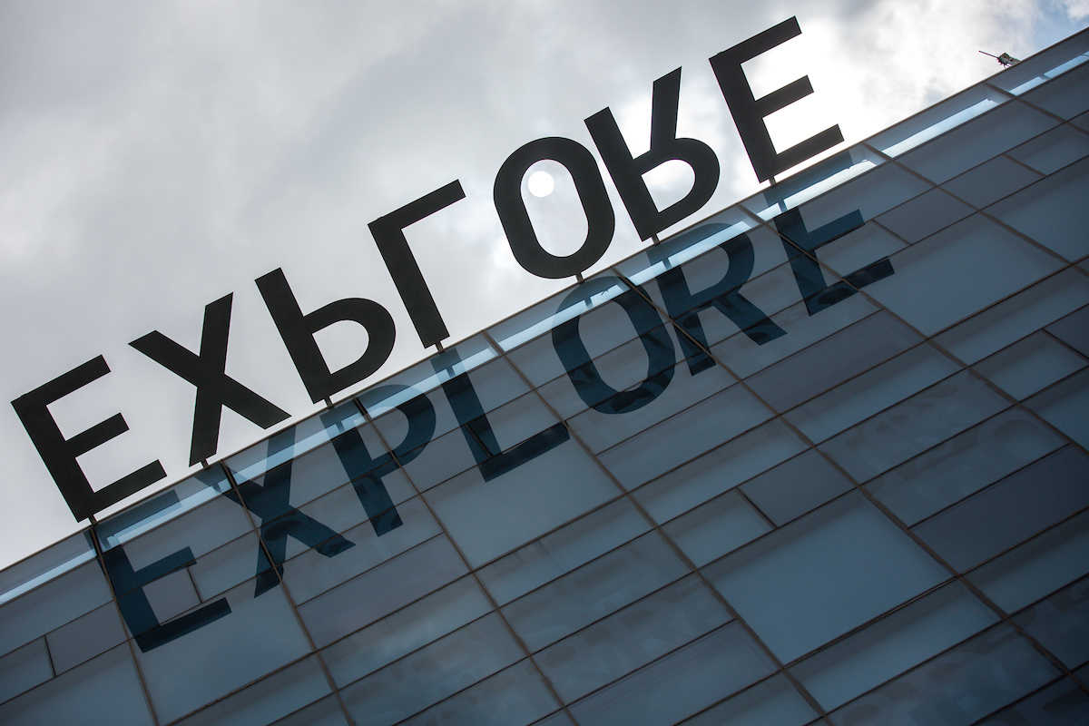 The word 'explore' on top of a Lattie F. Coor Hall at Arizona State University Tempe campus